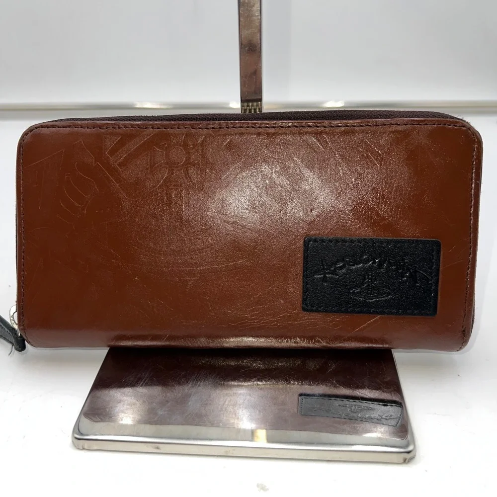 Vivienne Westwood Anglomania Brown Embossed Orb Logo Zip Around Wallet - Picture 1 of 10